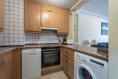 Cafetera express en la cocina de Teide View Balcones de Los Gigantes.