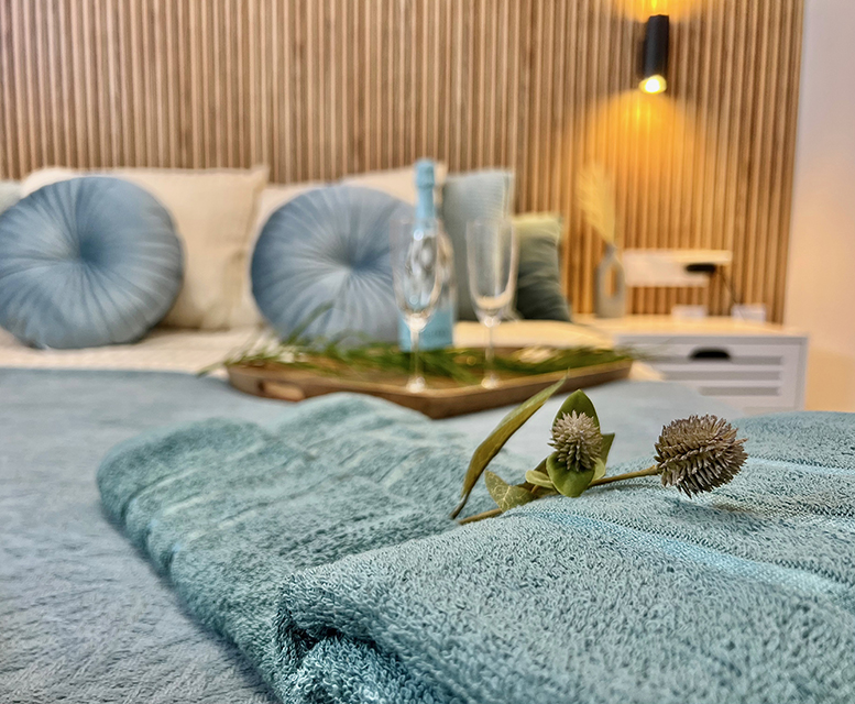 Bedroom in Callao Ocean View Luxury Apartment with warm lighting and intimate atmosphere.