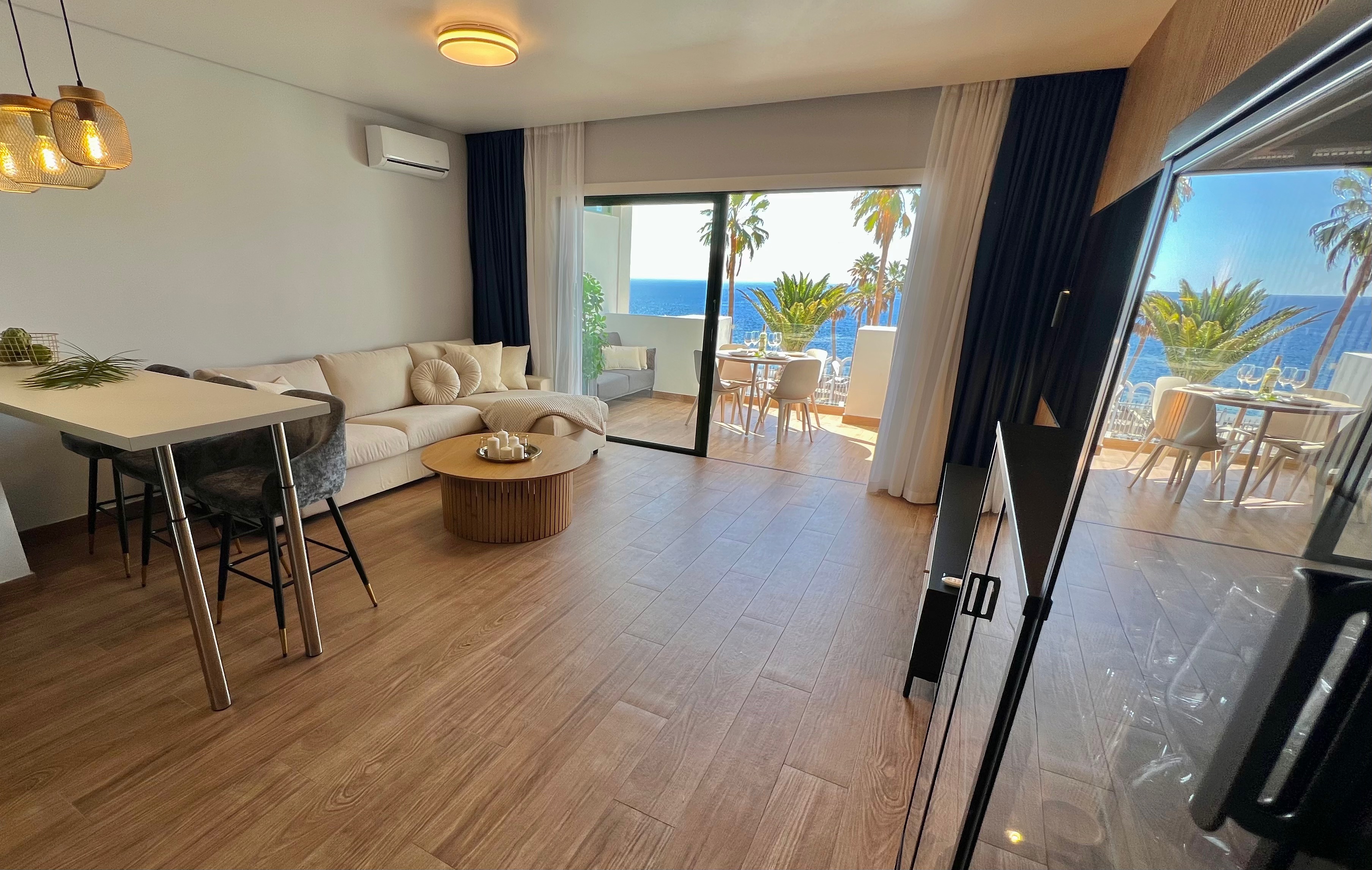 Callao Ocean View Luxury Apartment living room, a harmonious daytime space with natural materials.