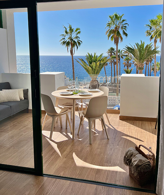 Modern terrace in Callao Salvaje, offering an uninterrupted view of the ocean's blue.